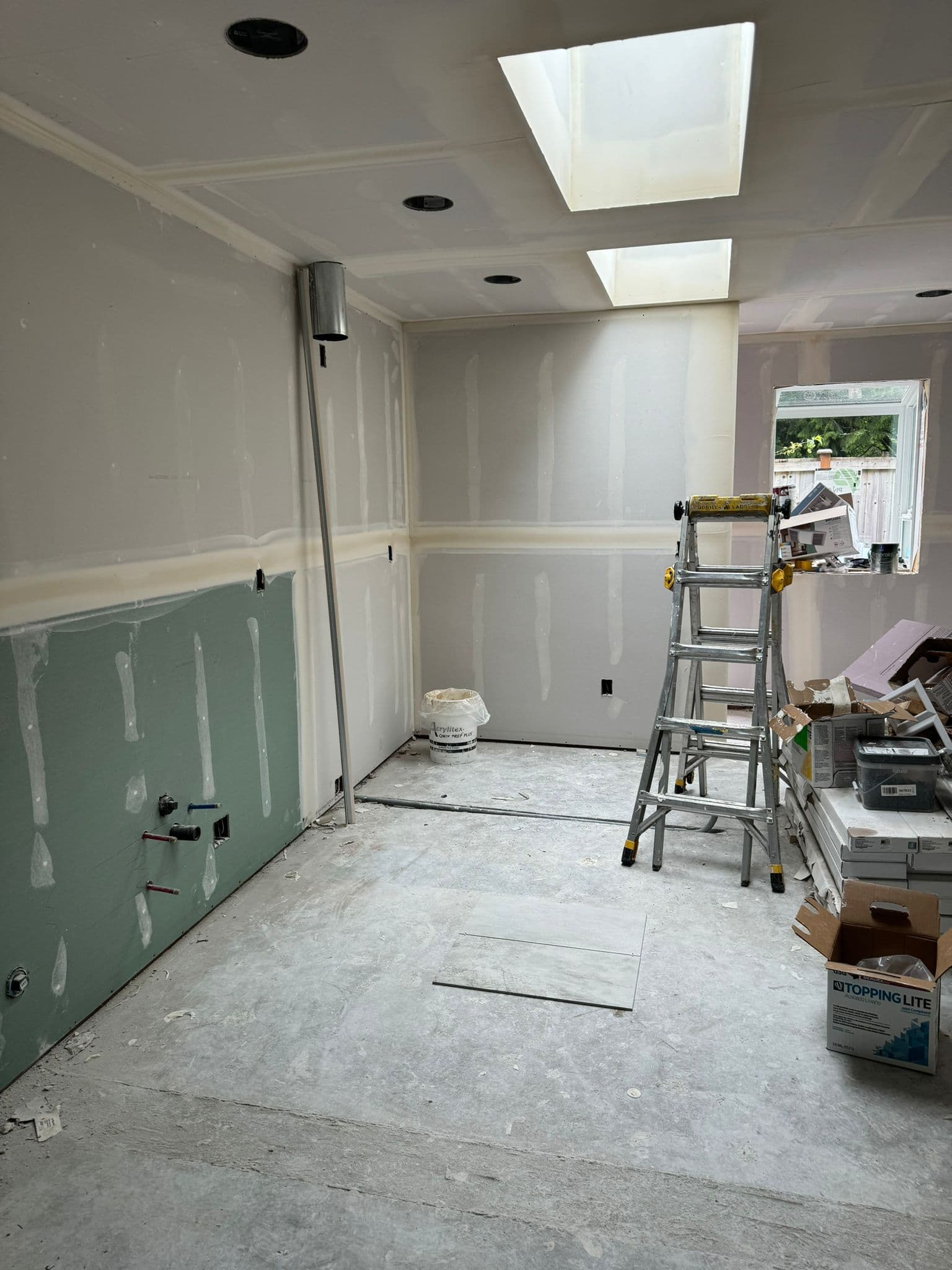 Drywall hung + ceilings finished
