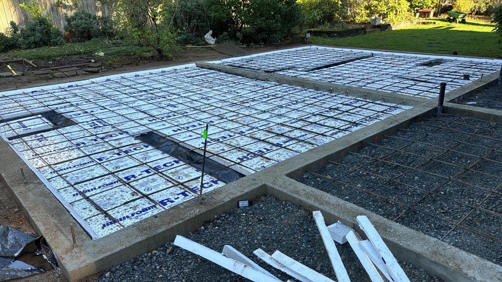 Slab rebar grid and conduit