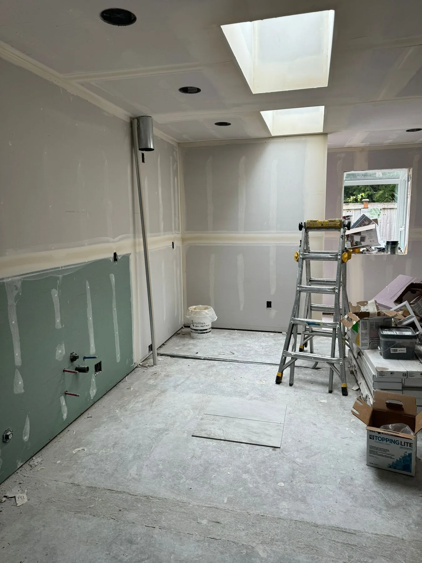 Drywall hung and ceilings finished