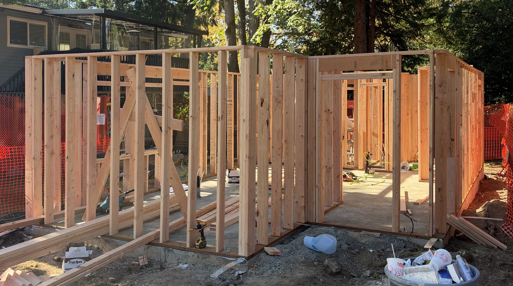 The Kirkland DADU under construction: framed walls on the poured slab
