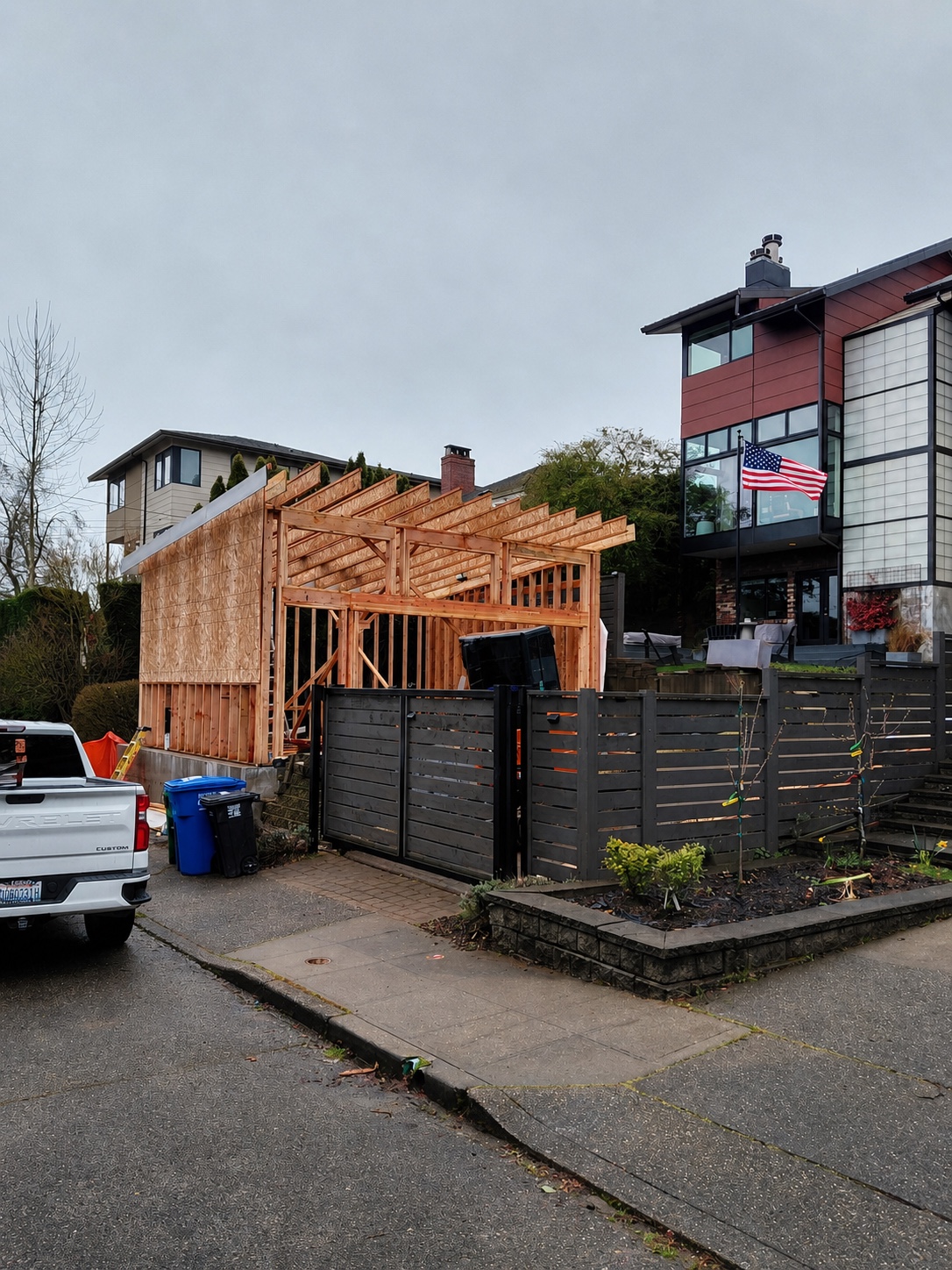 Roof rafters going up on the Magnolia DADU jobsite, an MNBE Construction project in the Pacific Northwest