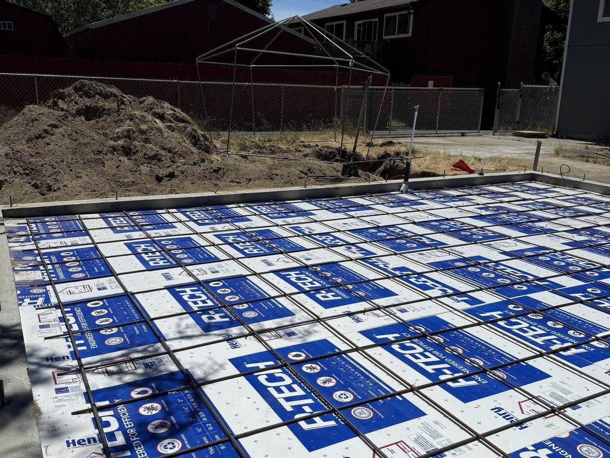 Rigid foam insulation and rebar grid before the slab pour