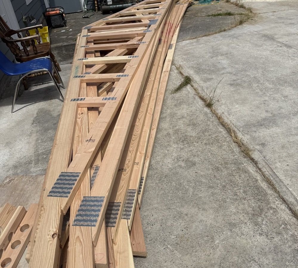 Roof trusses staged and ready for the crane